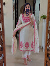 Stylish White Ensemble with Floral Accents