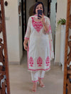 Stylish White Ensemble with Floral Accents