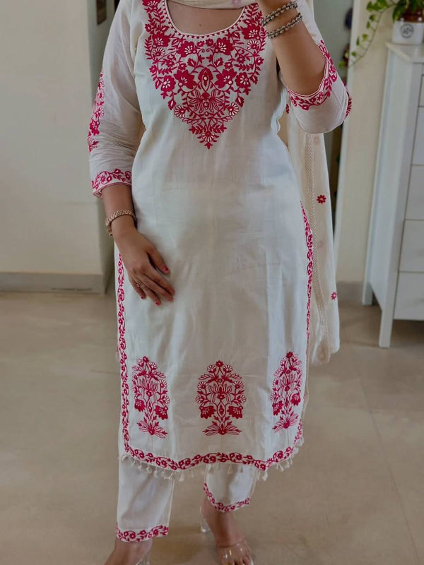 Stylish White Ensemble with Floral Accents