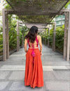 Capturing Joy in Vibrant Orange Attire