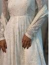 Radiant Reflections: The White Dress Selfie