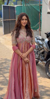 Elegant Woman in Striking Dress Pose
