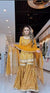 Golden Glow: A Woman's Poised Presence