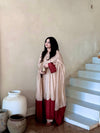 Graceful Presence Ascending the Staircase