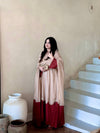 Graceful Presence Ascending the Staircase