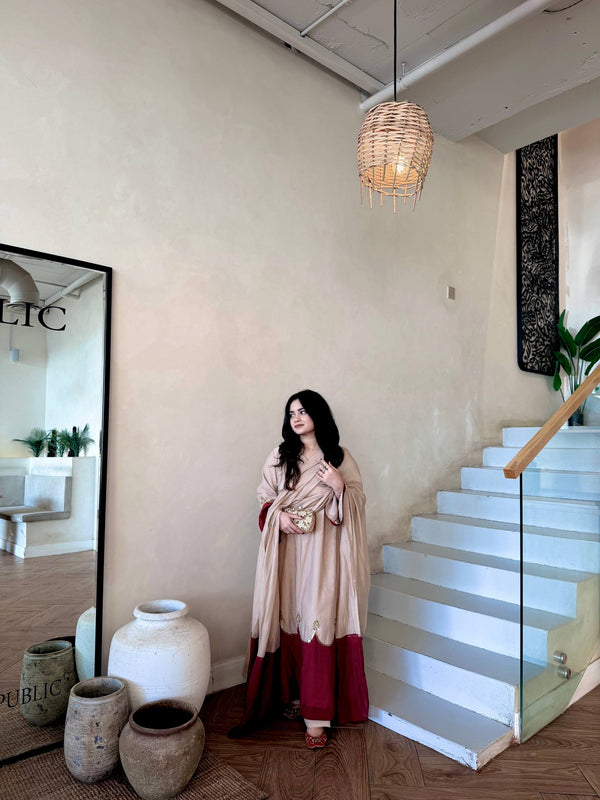 Graceful Presence Ascending the Staircase
