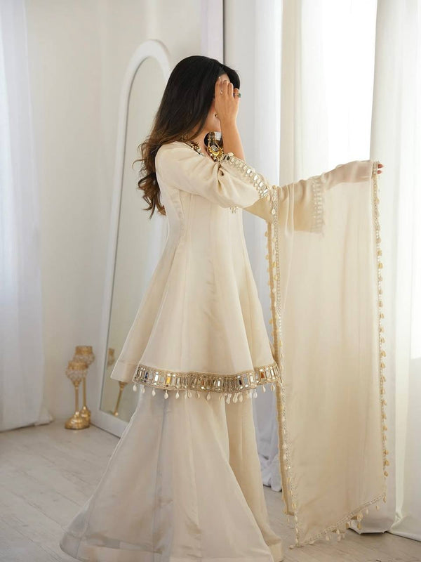 Elegance in White: A Timeless Pose