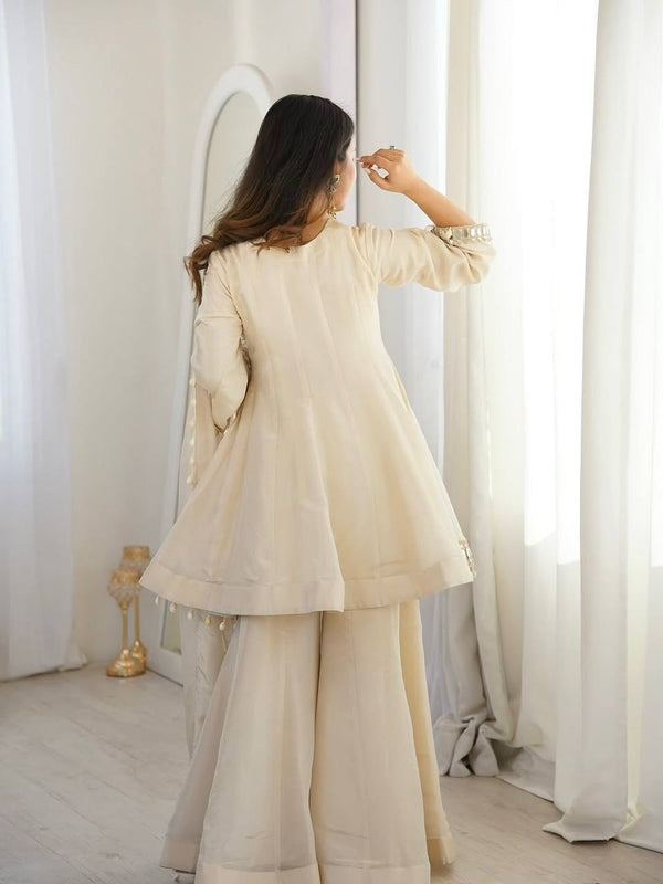 Elegance in White: A Timeless Pose