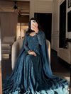 Elegance in Blue on a Cozy Couch