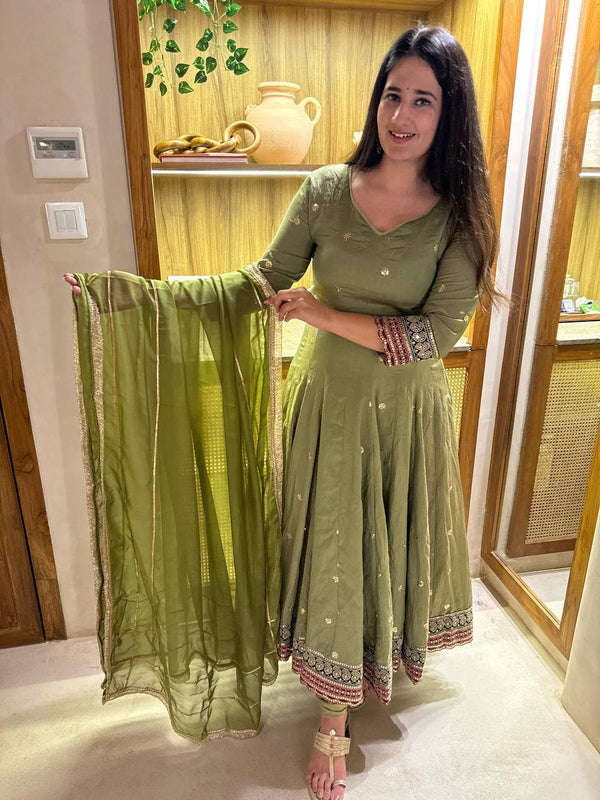 Radiant Beauty: Posing in Emerald Attire