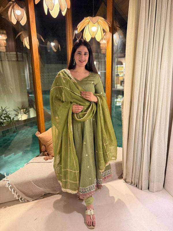 Radiant Beauty: Posing in Emerald Attire