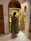 Radiant Beauty: Posing in Emerald Attire