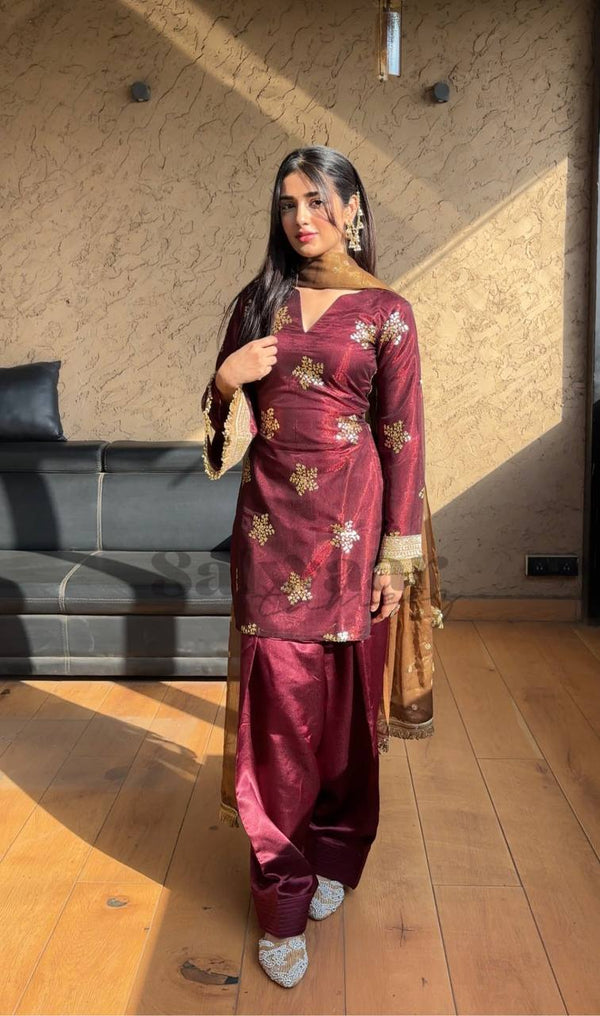 Graceful Woman in Maroon Salaf Ensemble