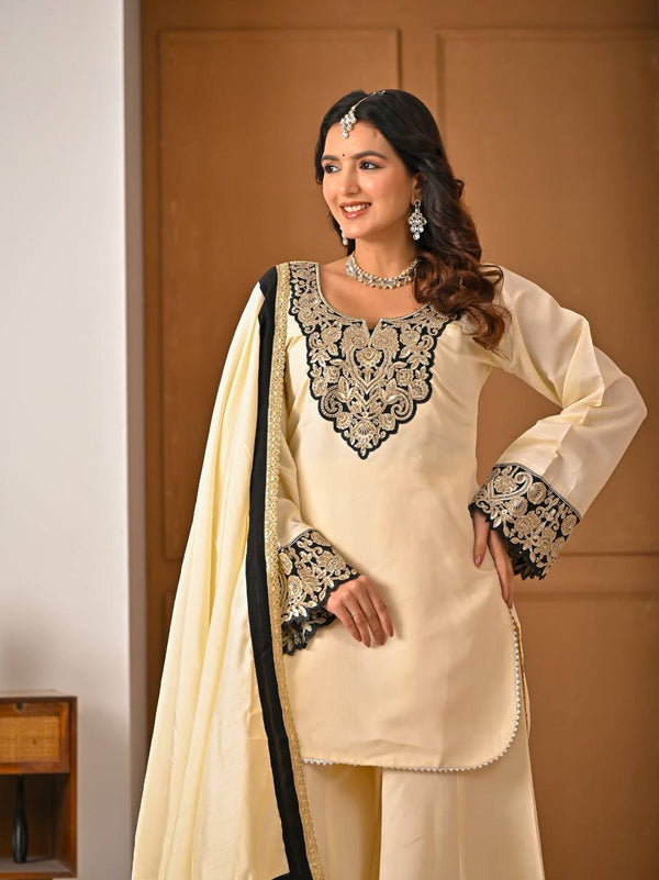 Chic Cream Attire Featuring Bold Black Details