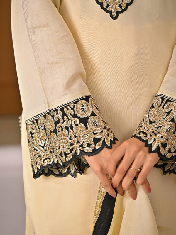 Chic Cream Attire Featuring Bold Black Details