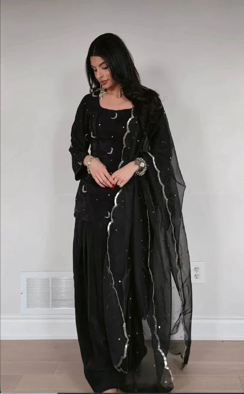 Glamorous Black Outfit with Silver Accents