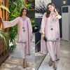 Graceful Woman in Pink Traditional Attire