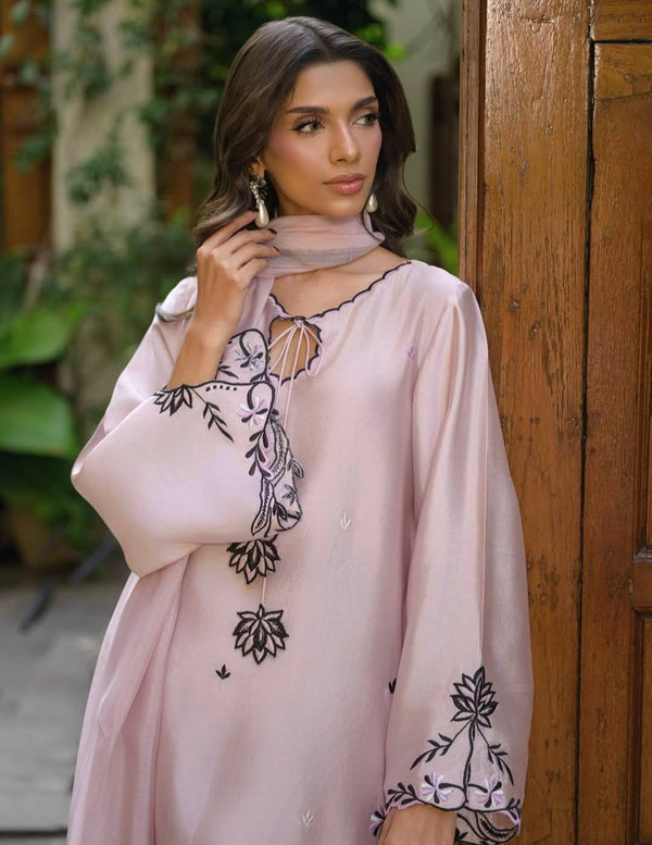 Graceful Woman in Pink Traditional Attire