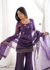Elegant Woman in Stunning Purple Dress