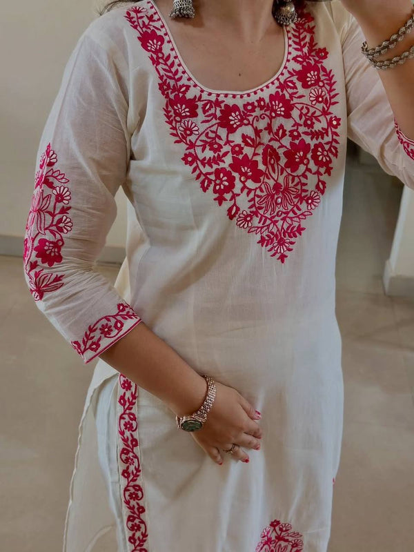 Stylish White Ensemble with Floral Accents