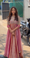 Elegant Woman in Striking Dress Pose