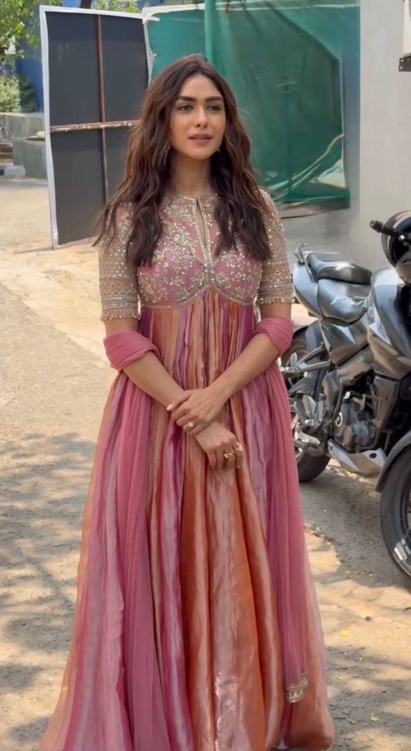 Elegant Woman in Striking Dress Pose