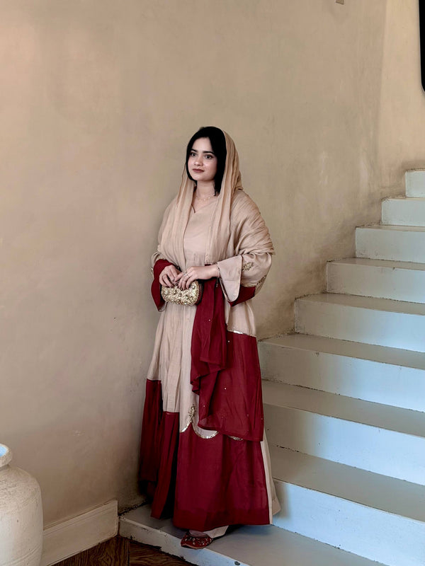 Graceful Presence Ascending the Staircase