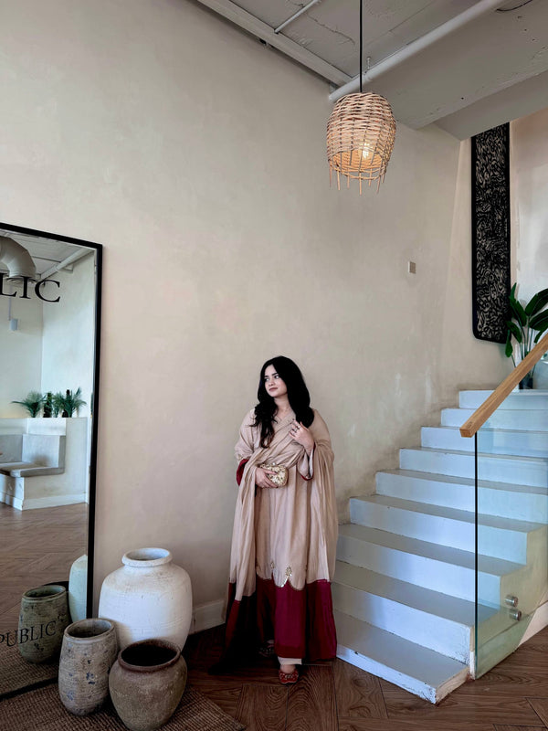 Graceful Presence Ascending the Staircase