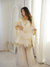 Elegance in White: A Timeless Pose
