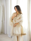Elegance in White: A Timeless Pose