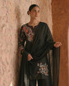 Timeless Black Attire with Floral Accents