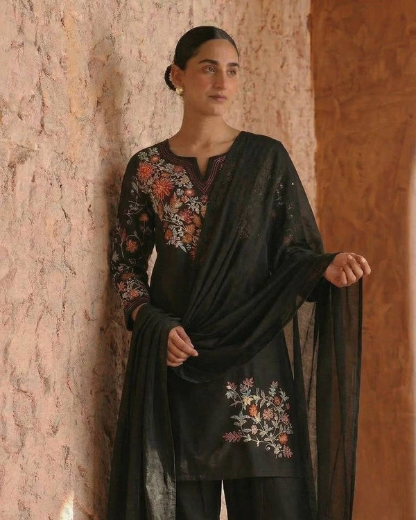 Timeless Black Attire with Floral Accents