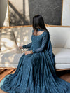 Elegance in Blue on a Cozy Couch
