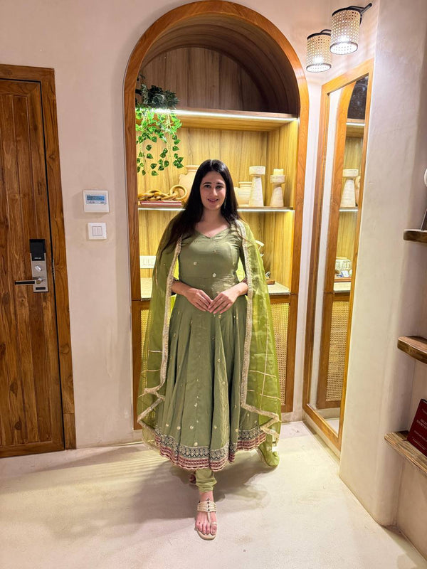 Radiant Beauty: Posing in Emerald Attire