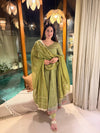 Radiant Beauty: Posing in Emerald Attire