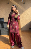 Graceful Woman in Maroon Salaf Ensemble