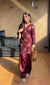 Graceful Woman in Maroon Salaf Ensemble