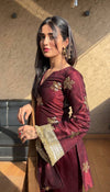 Graceful Woman in Maroon Salaf Ensemble