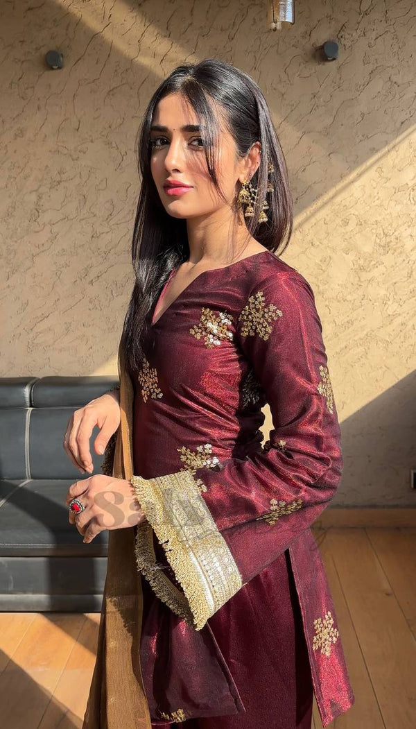 Graceful Woman in Maroon Salaf Ensemble