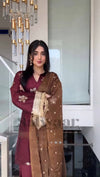 Graceful Woman in Maroon Salaf Ensemble