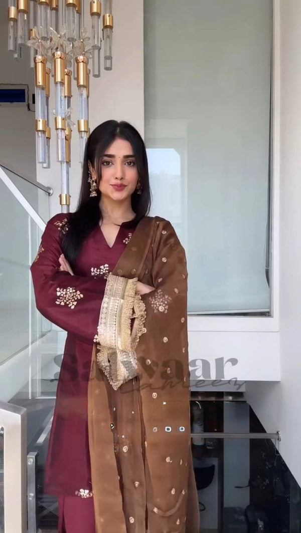 Graceful Woman in Maroon Salaf Ensemble