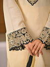 Chic Cream Attire Featuring Bold Black Details