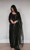 Glamorous Black Outfit with Silver Accents