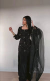 Glamorous Black Outfit with Silver Accents