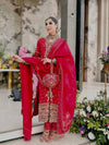 Radiant Elegance: The Red Wedding Ensemble