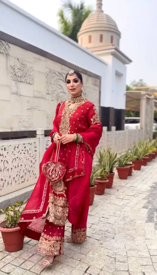 Radiant Elegance: The Red Wedding Ensemble