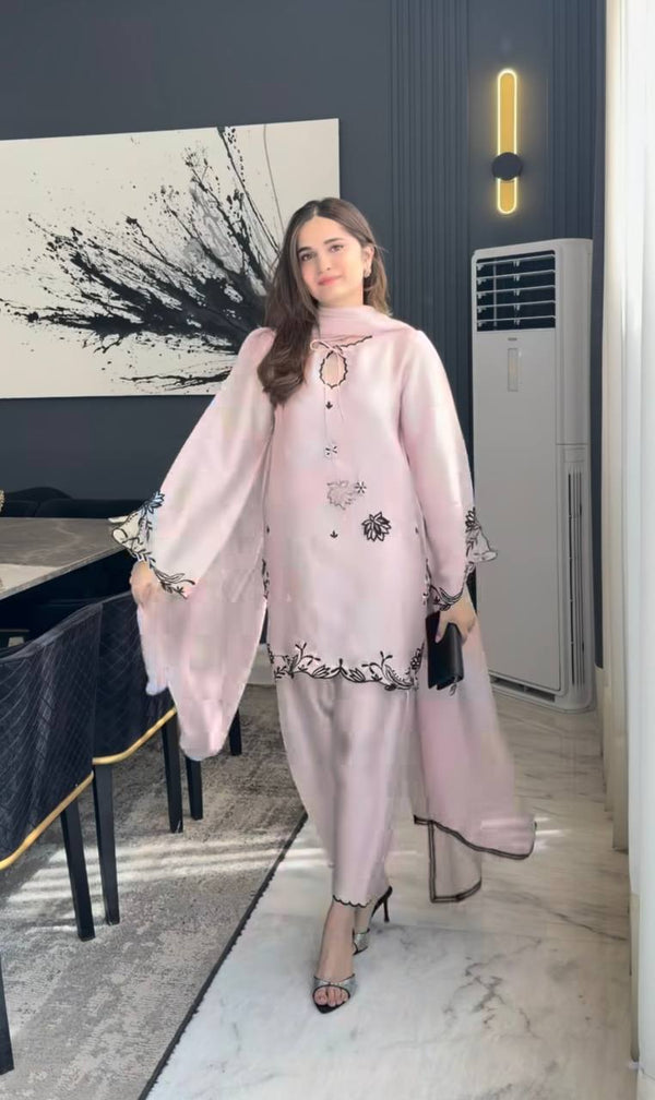Graceful Woman in Pink Traditional Attire