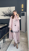 Graceful Woman in Pink Traditional Attire